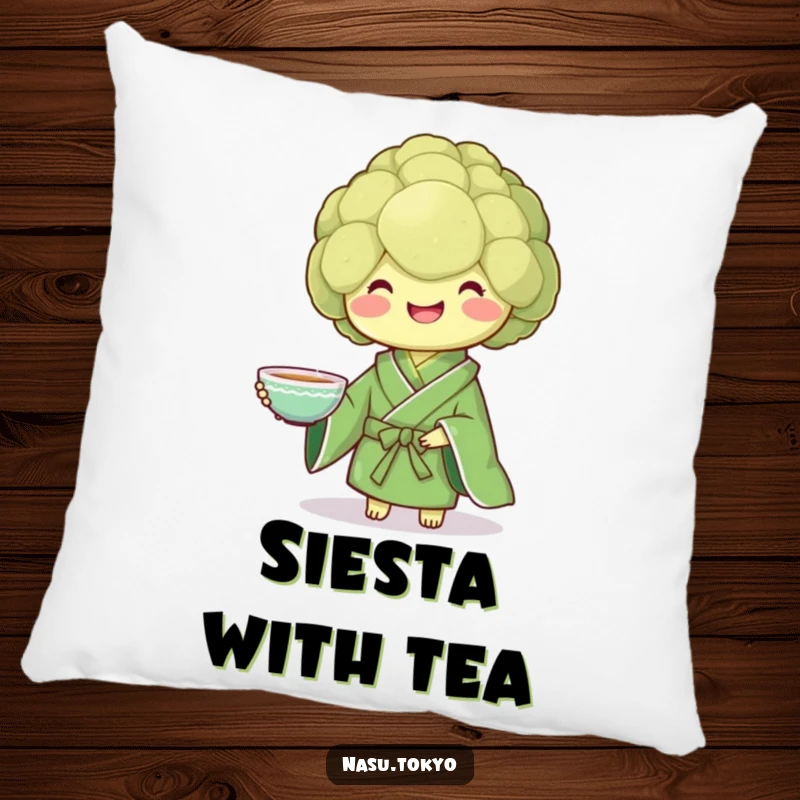 Funny broccoli in a green kimono holding a teacup, a soft and humorous pillow for cozy spaces.