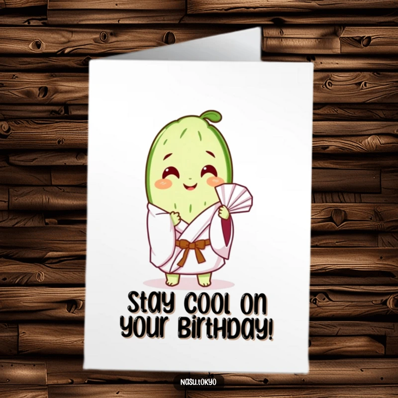 Funny Free Printable Birthday Card featuring a happy cucumber slice in a white kimono, fanning itself with a serene, cool expression.